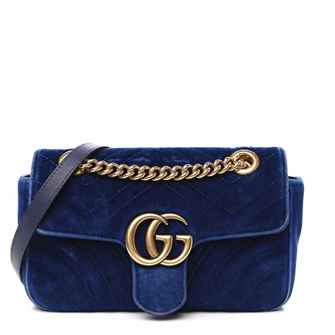 blue gucci velvet bag.